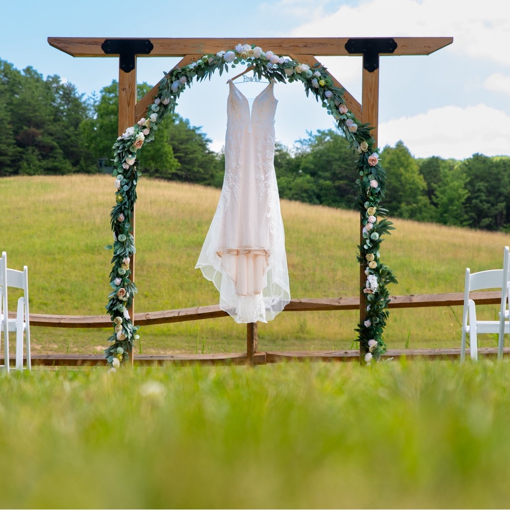 **dress not for sale. Handmade Faux flower arch for sell